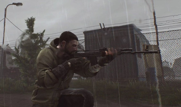 Reshala, Customs scav boss, stands idle in the rain