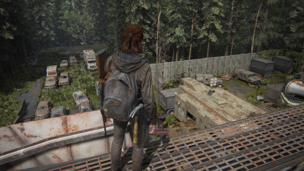 Ellie, the deuteragonist of The Last of Us, looks over the main gate of Seattle