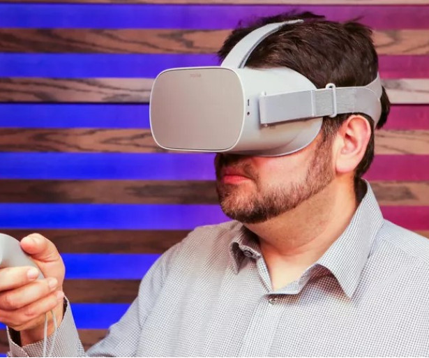 Man playing with the Oculus Go